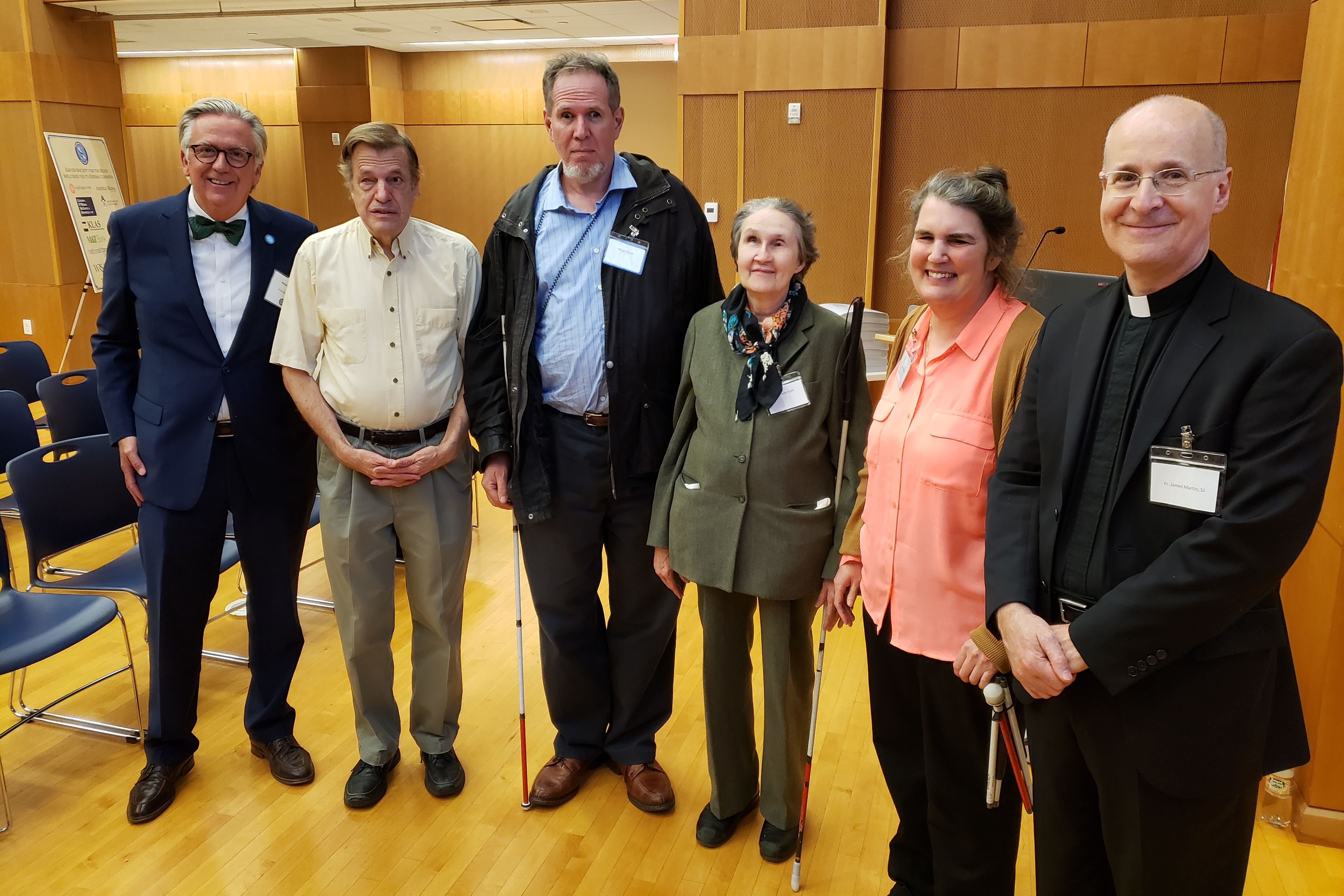 Our clients and Executive Director pictured with Father James Martin, SJ