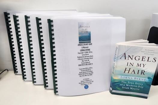 Five volumes of braille with print version of the book