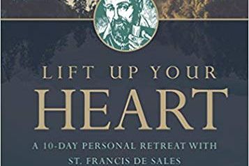 Cover of the book showing a depiction of St. Francis de Sales against a woodland