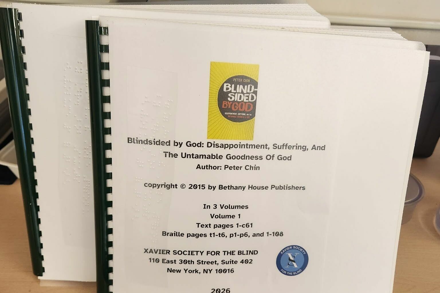 Two volumes of braille