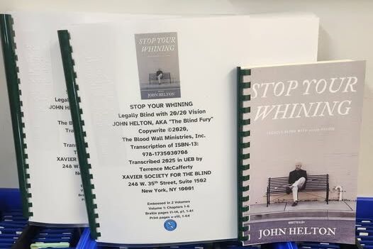 2 volumes of braille with print version of the book