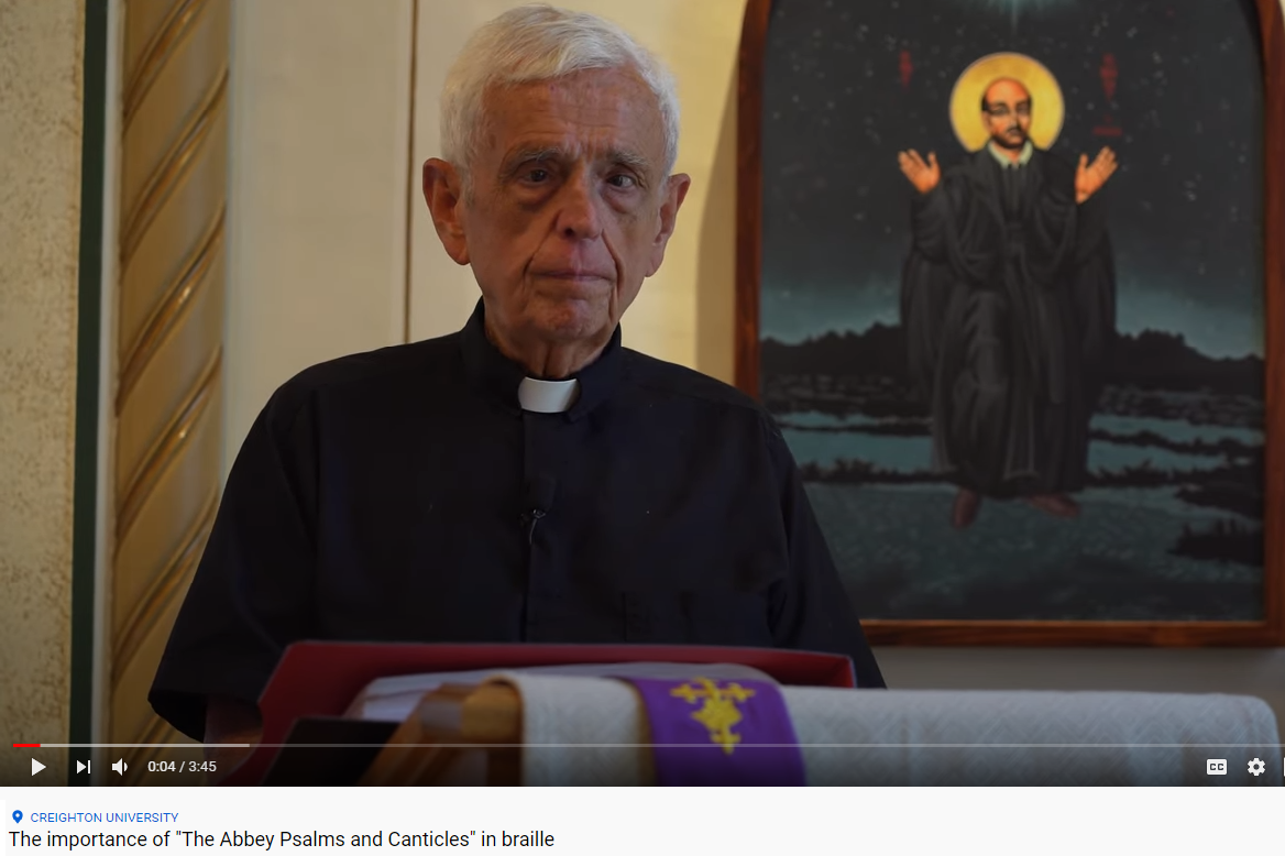 Screenshot of a video of Father Larry Gillick discussing our Summer Braille Challenge