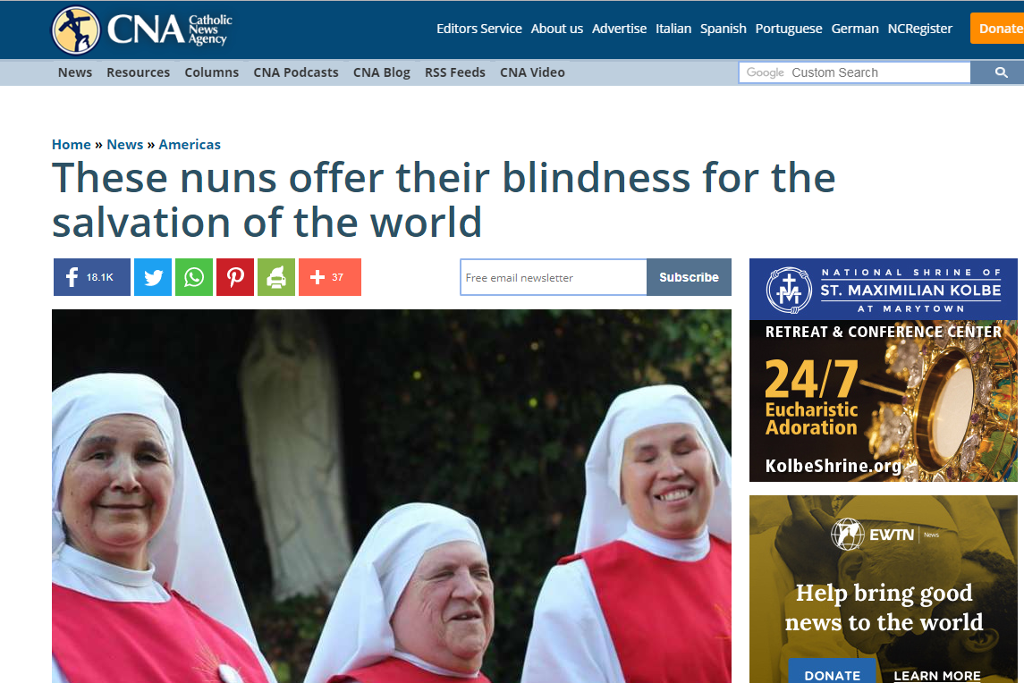 Three nuns dressed in red habits smiling at the camera