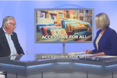 Malachy and anchor Christine Persechetti discussing  Pope Francis' autobiography in braille
