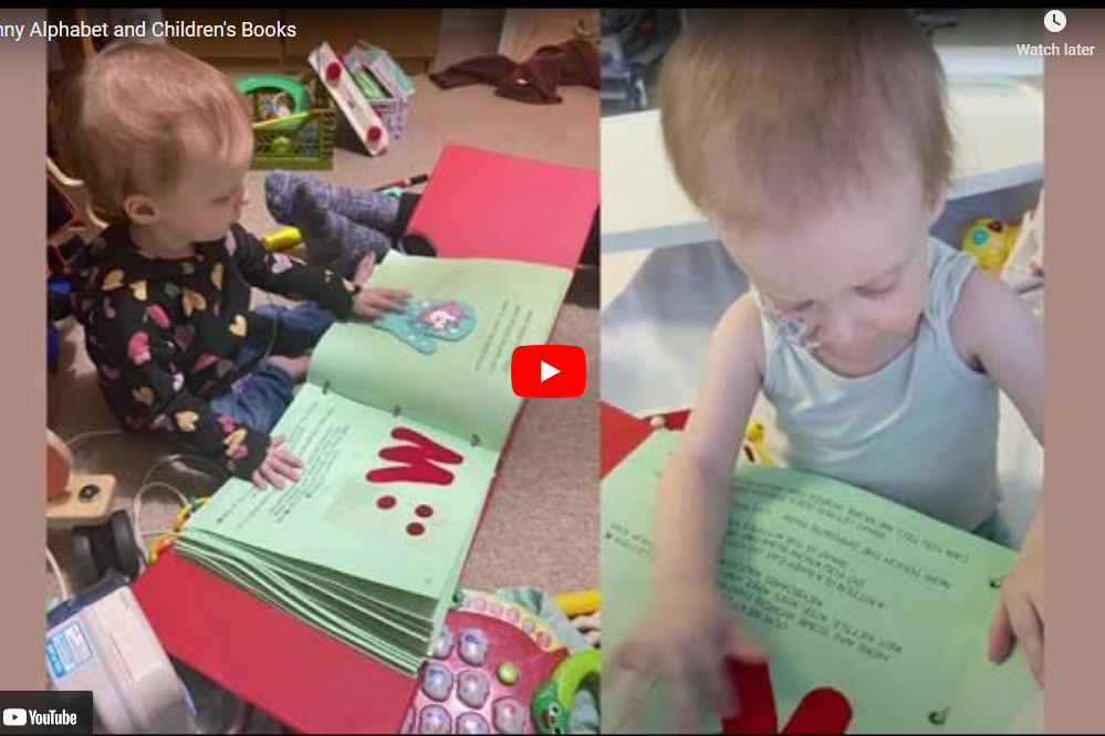 A young girl reading the Funny Alphabet in braille