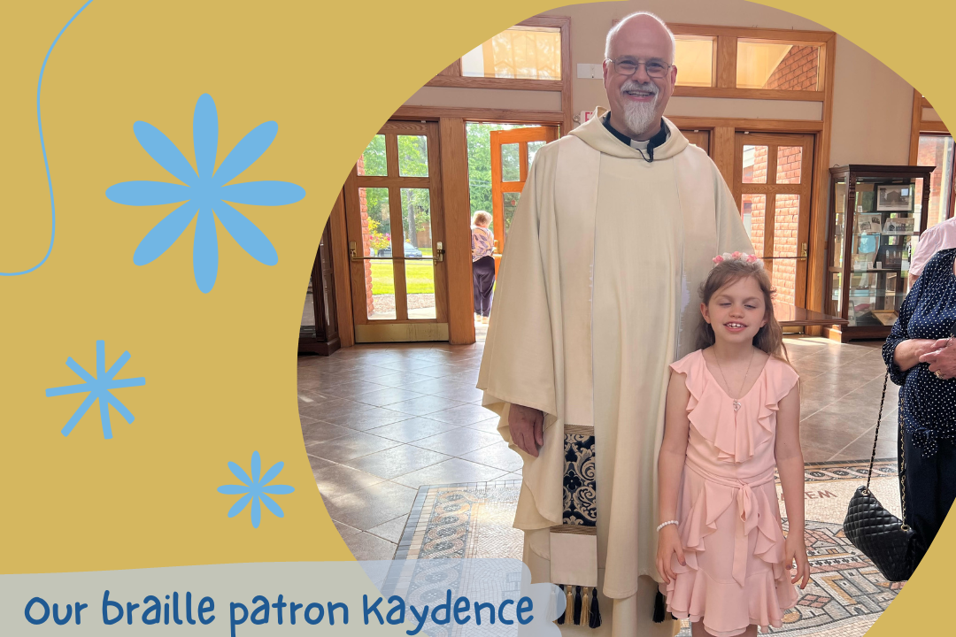 Kaydence, a young blonde girl, in a pink dress, standing next to her parish priest