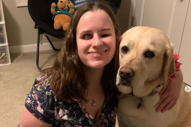 Our client Jessica with her guide dog