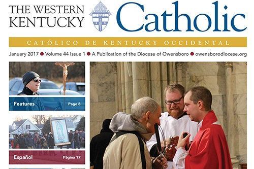 Front page of the Western Kentucky Catholic showing Father Dennis blessing a blind man at the altar